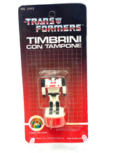 Carica l'immagine nel visualizzatore di Gallery, Packaging view of the 1984 Transformers Official Stamp Jazz toy with colorful graphics.