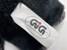 Load image into Gallery viewer, Close-up of the tag on Dan Dee Black Ape Gorilla plush showing brand logo.