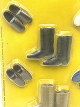 Load image into Gallery viewer, Mattel Barbie Friends Ken Brad Shoes set detail view of various miniature boots in clear packaging.