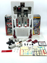 Load image into Gallery viewer, alt="Accessori originali inclusi nel Transformers Metroplex 1985 – Hasbro Takara"