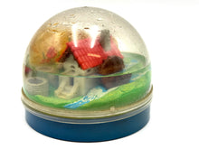 Load image into Gallery viewer, Close-up of the illuminated interior of the Megasfera Luminosa house toy