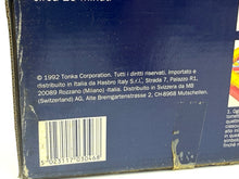 Carica l'immagine nel visualizzatore di Gallery, Close-up of Parker‑Tonka MB branding and era labeling on Dynamite game box