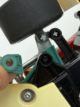 Load image into Gallery viewer, Close-up showing broken front axle part of Gig Nikko Super Kart F1 RC car