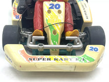 Load image into Gallery viewer, Close-up showing yellowing on body parts of Gig Nikko Super Kart F1 RC car