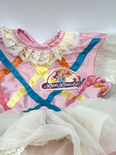 Load image into Gallery viewer, Costume pieces inside open box, with light dust visible on fabric and accessories