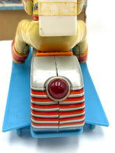 Load image into Gallery viewer, Back view of Masudaya Space Scooter Astronaut Rider showing broken rear light and battery cover