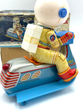 Load image into Gallery viewer, Close-up showing broken battery cover and backpack pin on astronaut figure