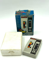 Load image into Gallery viewer, Close-up condition of vintage Mattel Auto Race electronic handheld game 1976