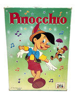 Load image into Gallery viewer, Front view of 1980s Disney Pinocchio costume with original box