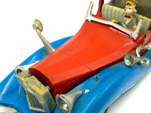 Load image into Gallery viewer, Close-up of Politoys M559 Uncle Scrooge Car showing missing parts and restoration needs