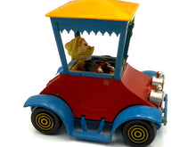 Load image into Gallery viewer, Side view of Politoys W3 Grandma Duck car showing vintage details