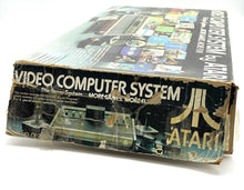 Load image into Gallery viewer, Atari game system box featuring graphic design and game title.
