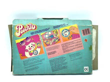 Load image into Gallery viewer, Collectible Poochie badges from the 1980s – detail view of various badges and packaging
