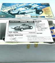 Load image into Gallery viewer, Nikko 1/18 scale RC buggy presented as a collector item.
