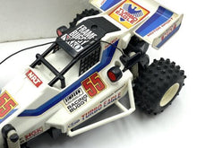 Load image into Gallery viewer, Side view of the vintage Nikko frame buggy with remote control.

