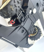 Load image into Gallery viewer, Detail view of the Nikko Black Cat Laser 4WD mechanical components.
