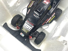 Load image into Gallery viewer, Rear view of the Nikko Black Cat Laser 4WD displaying detailed design.
