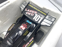 Load image into Gallery viewer, Top view of the Nikko Black Cat Laser 4WD showcasing its detailed design.
