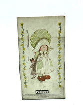 Load image into Gallery viewer, Front view of SARAH KAY 70s valentine tiny rag doll in decorative packaging.
