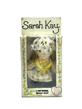 Load image into Gallery viewer, Packaging view of SARAH KAY 70s valentine tiny rag doll with transparent window.
