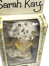 Load image into Gallery viewer, Side view of SARAH KAY 70s valentine tiny rag doll in illustrated packaging.
