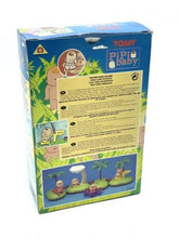 Load image into Gallery viewer, VINTAGE TOMY 90'S TINKLE TOTS BOAT ISLAND back view showcasing instruction list and cartoon graphics.
