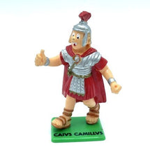 Load image into Gallery viewer, Side view of the Roman soldier figurine with detailed armor and a green base.
