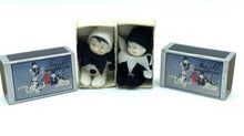 Load image into Gallery viewer, Packaging view of two decorative boxes featuring illustrated designs in blue, black, and white.
