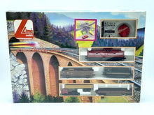 Load image into Gallery viewer, Lima train set packaging featuring scenic background and vibrant colors.
