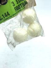 Load image into Gallery viewer, Subbuteo packaging display of three white footballs highlighted with green and brown.
