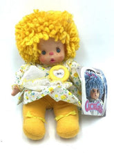 Load image into Gallery viewer, Front view of Patapouf New Girl doll with yellow curly hair and colorful outfit.
