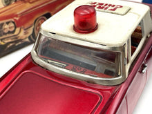 Load image into Gallery viewer, Detailed view of the vintage toy car showing chrome accents and light on top.
