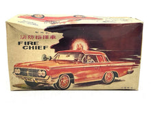 Load image into Gallery viewer, Tin Toy 1960's RED CHINA ME 7O2 FIRE CHIEF CAR packaging view with illustrated design.
