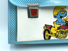 Load image into Gallery viewer, Smurfs Official close-up detail of the blue cartoon school bag highlighting the cartoon character design.
