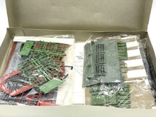 Load image into Gallery viewer, VINTAGE LIMA train set contents view displaying assembled parts and packaging materials.
