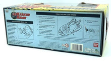Load image into Gallery viewer, Detailed view of toolbox packaging for Bandai Magno talking car with product illustrations.
