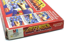 Load image into Gallery viewer, Side view of MB Games Defender Board Game highlighting illustrated box and game components.
