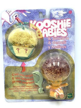 Load image into Gallery viewer, Front view of the Koosh kooshie babies TRUCIOLONES packaging featuring playful design in yellow, brown, and purple.
