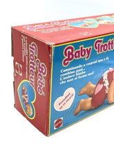 Load image into Gallery viewer, Side view of Mattel 1982 Baby That Away doll with blonde hair and heart logo.
