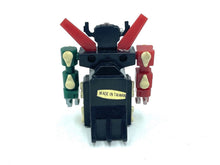 Load image into Gallery viewer, Back view of the 1984 mini Voltron robot displaying its colorful design.
