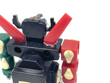 Load image into Gallery viewer, Close-up detail of the 1984 mini Voltron robot showing articulated limbs.
