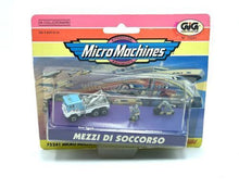 Load image into Gallery viewer, Front view of Galoob Micro Machines Service Master TOW TRUCK Mechanic in packaging with toy car inside.
