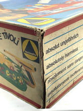 Load image into Gallery viewer, Detail of the corner of the game box showing worn edges and printed text.
