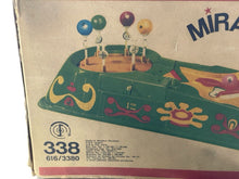 Load image into Gallery viewer, Side view of the game box featuring colorful graphics and printed details.
