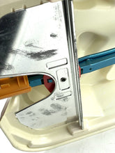 Load image into Gallery viewer, Close-up of a metallic tool with a cutting edge from the Technofix game.

