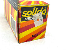 Load image into Gallery viewer, Close-up of the Vintage Solido 1209 BMW M1 1/43 diecast model car in red with transparent window.

