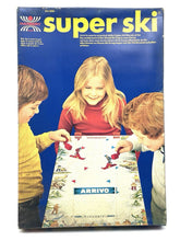 Load image into Gallery viewer, Super Ski Coppa del mondo di sci Harbert game box with colorful graphics and children playing.

