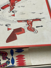 Load image into Gallery viewer, Various model parts included in the Super Ski game packaging.
