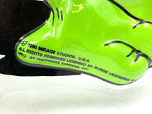 Carica l'immagine nel visualizzatore di Gallery, Detail close-up of a green shoe with text branding and swoosh logo.
