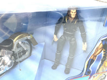 Load image into Gallery viewer, Close-up view of the black action figure in a standing pose with detailed features.
